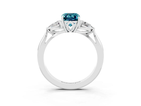 Silver Three-Stone Emerald Cut Cut Diamond Ring with Pear Side Stones in Four-Prong Setting