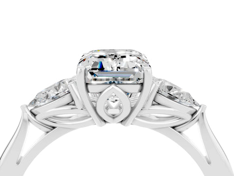 White gold Three-Stone Emerald Cut Cut Diamond Ring with Pear Side Stones in Four-Prong Setting_4
