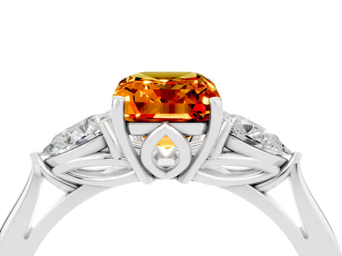 White gold Three-Stone Emerald Cut Cut Diamond Ring with Pear Side Stones in Four-Prong Setting_4