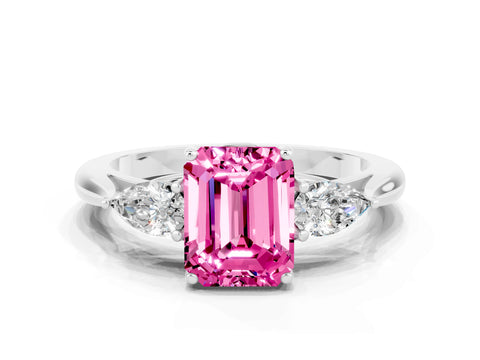 White gold Three-Stone Emerald Cut Cut Diamond Ring with Pear Side Stones in Four-Prong Setting