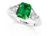 White gold Three-Stone Emerald Cut Cut Diamond Ring with Trillion Side Stones and Four-Prong Setting_1
