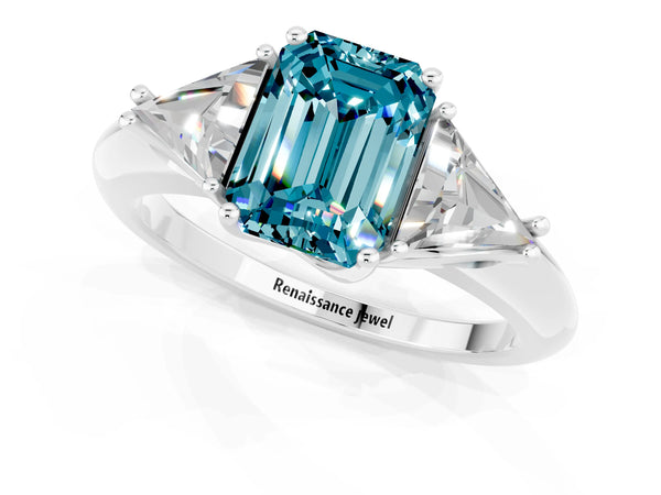 Platinum Three-Stone Emerald Cut Cut Diamond Ring with Trillion Side Stones and Four-Prong Setting