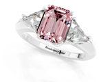 White gold Three-Stone Emerald Cut Cut Diamond Ring with Trillion Side Stones and Four-Prong Setting_1