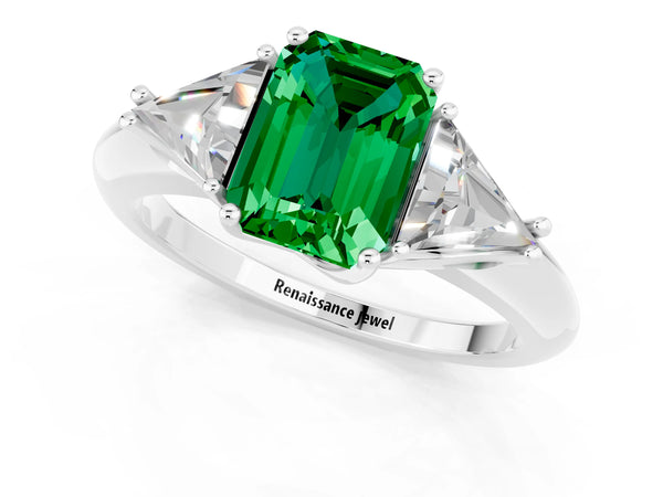 Platinum Three-Stone Emerald Cut Emerald Engagement Ring with Trillion Side Stones and Prong Setting