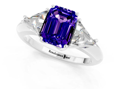 White gold Three-Stone Emerald Cut Cut Diamond Ring with Trillion Side Stones and Four-Prong Setting_1