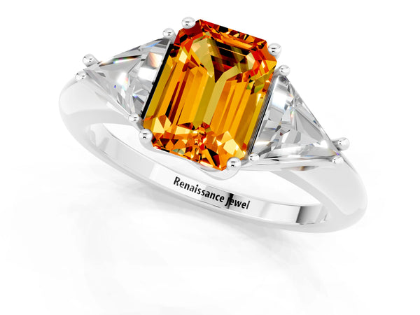 White gold Three-Stone Emerald Cut Cut Diamond Ring with Trillion Side Stones and Four-Prong Setting