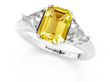 White gold Three-Stone Emerald Cut Cut Diamond Ring with Trillion Side Stones and Four-Prong Setting_1