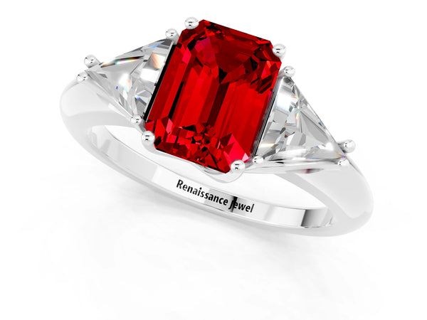 White gold Three-Stone Emerald Cut Ruby Engagement Ring with Trillion Side Stones and Prong Setting