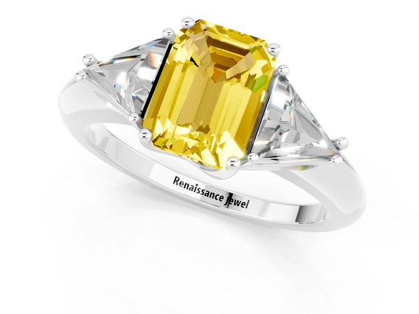 White gold Three-Stone Emerald Cut Yellow Sapphire Engagement Ring with Trillion Side Stones and Prong Setting