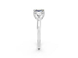 White gold Three-Stone Emerald Cut Cut Diamond Ring with Trillion Side Stones and Four-Prong Setting_2