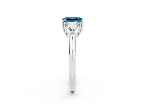 White gold Three-Stone Emerald Cut Cut Diamond Ring with Trillion Side Stones and Four-Prong Setting_2