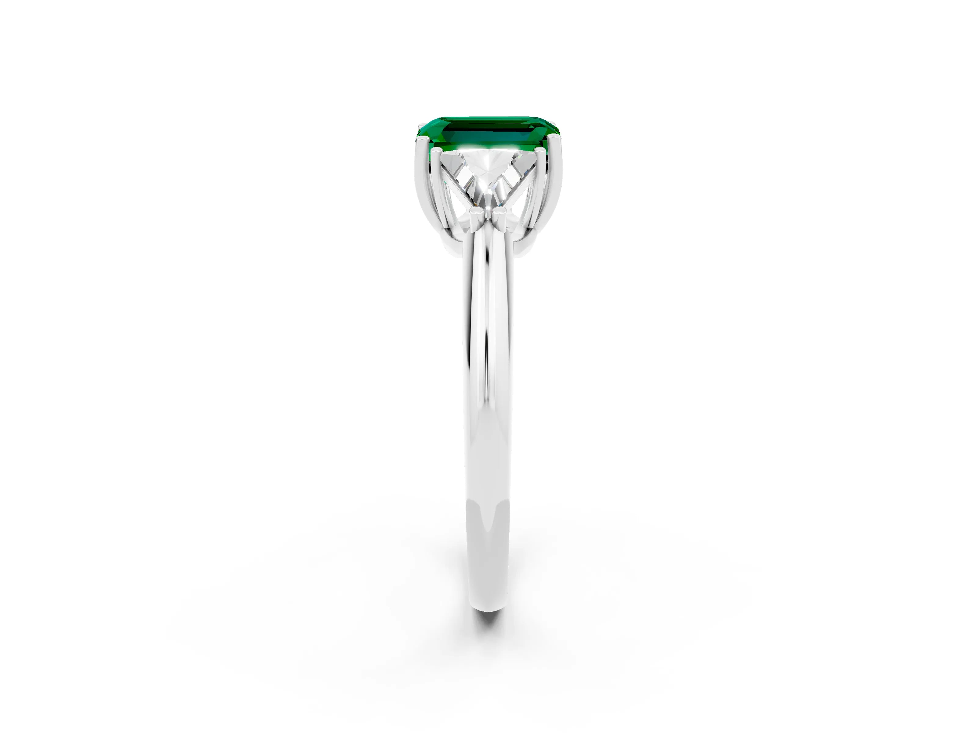 White gold Three-Stone Emerald Cut Cut Diamond Ring with Trillion Side Stones and Four-Prong Setting_2