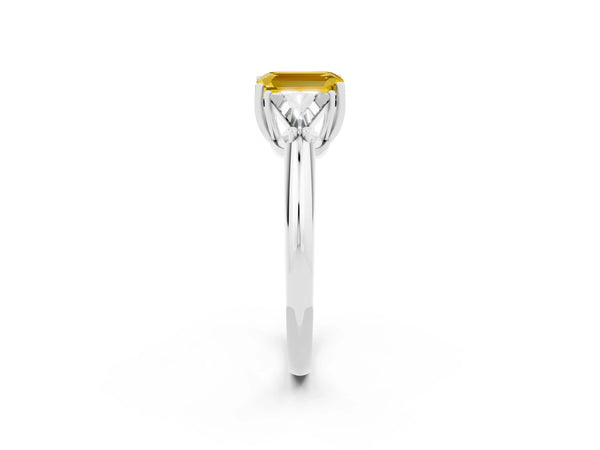 White gold Three-Stone Emerald Cut Yellow Sapphire Engagement Ring with Trillion Side Stones and Prong Setting