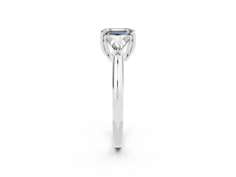 White gold Three-Stone Emerald Cut Cut Diamond Ring with Trillion Side Stones and Four-Prong Setting_2
