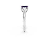 White gold Three-Stone Emerald Cut Cut Diamond Ring with Trillion Side Stones and Four-Prong Setting_2
