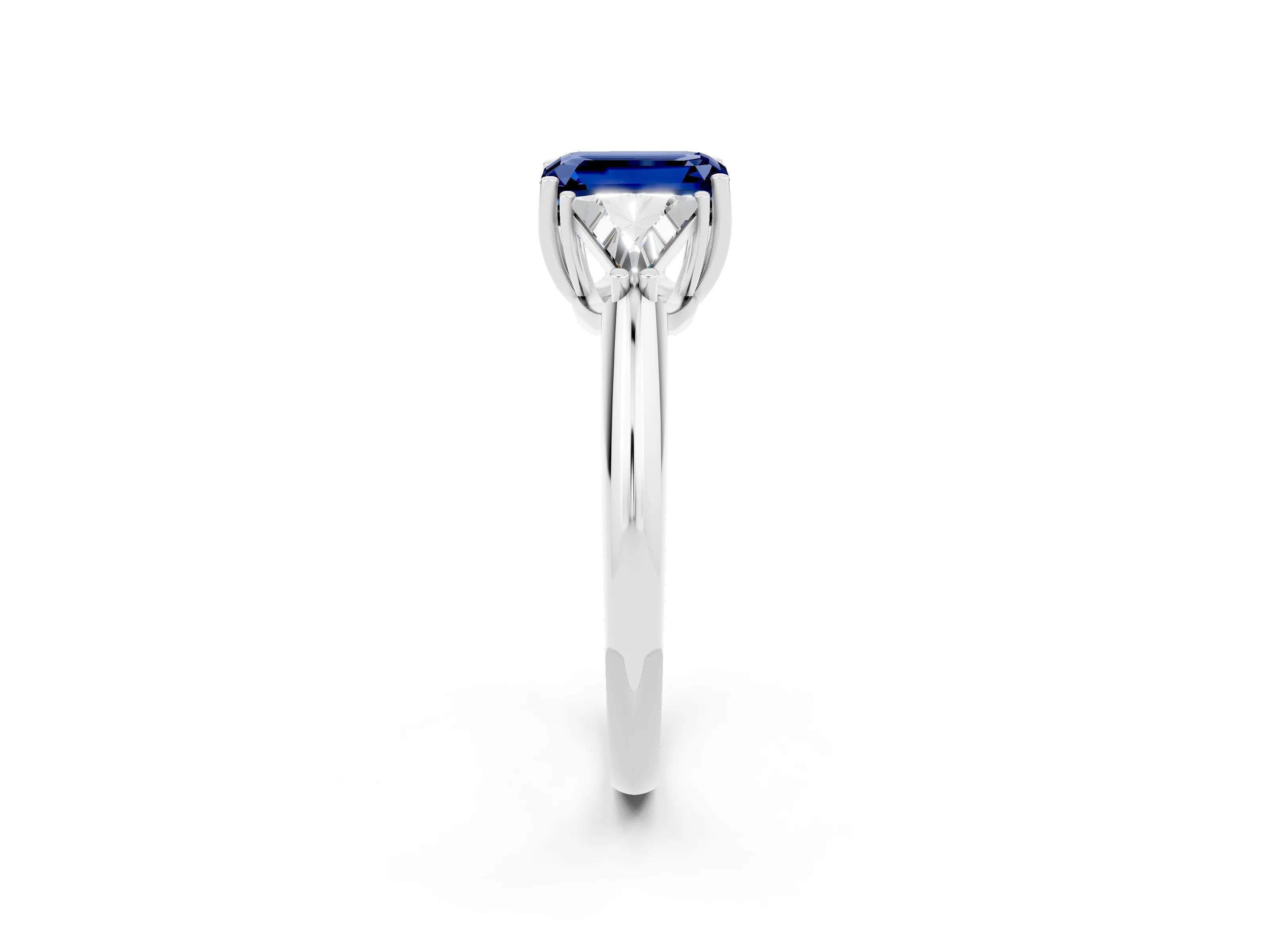 White gold Three-Stone Emerald Cut Cut Diamond Ring with Trillion Side Stones and Four-Prong Setting_2