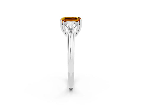 White gold Three-Stone Emerald Cut Cut Diamond Ring with Trillion Side Stones and Four-Prong Setting_2