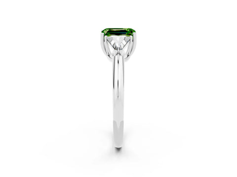 White gold Three-Stone Emerald Cut Cut Diamond Ring with Trillion Side Stones and Four-Prong Setting_2
