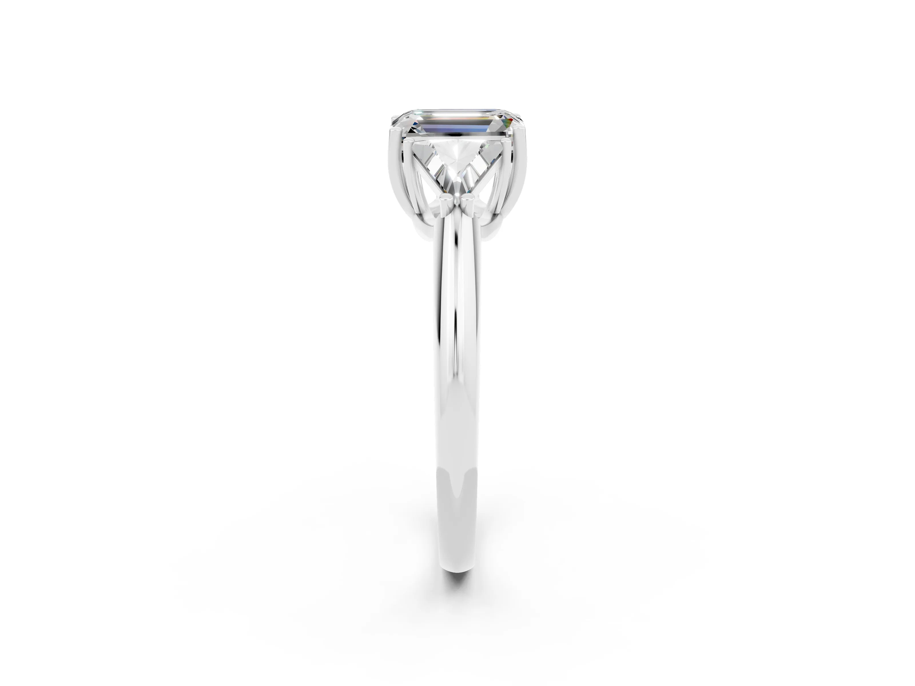 White gold Three-Stone Emerald Cut Cut Diamond Ring with Trillion Side Stones and Four-Prong Setting_2