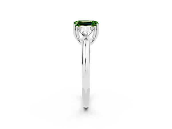 Silver Three-Stone Emerald Cut Cut Diamond Ring with Trillion Side Stones and Four-Prong Setting