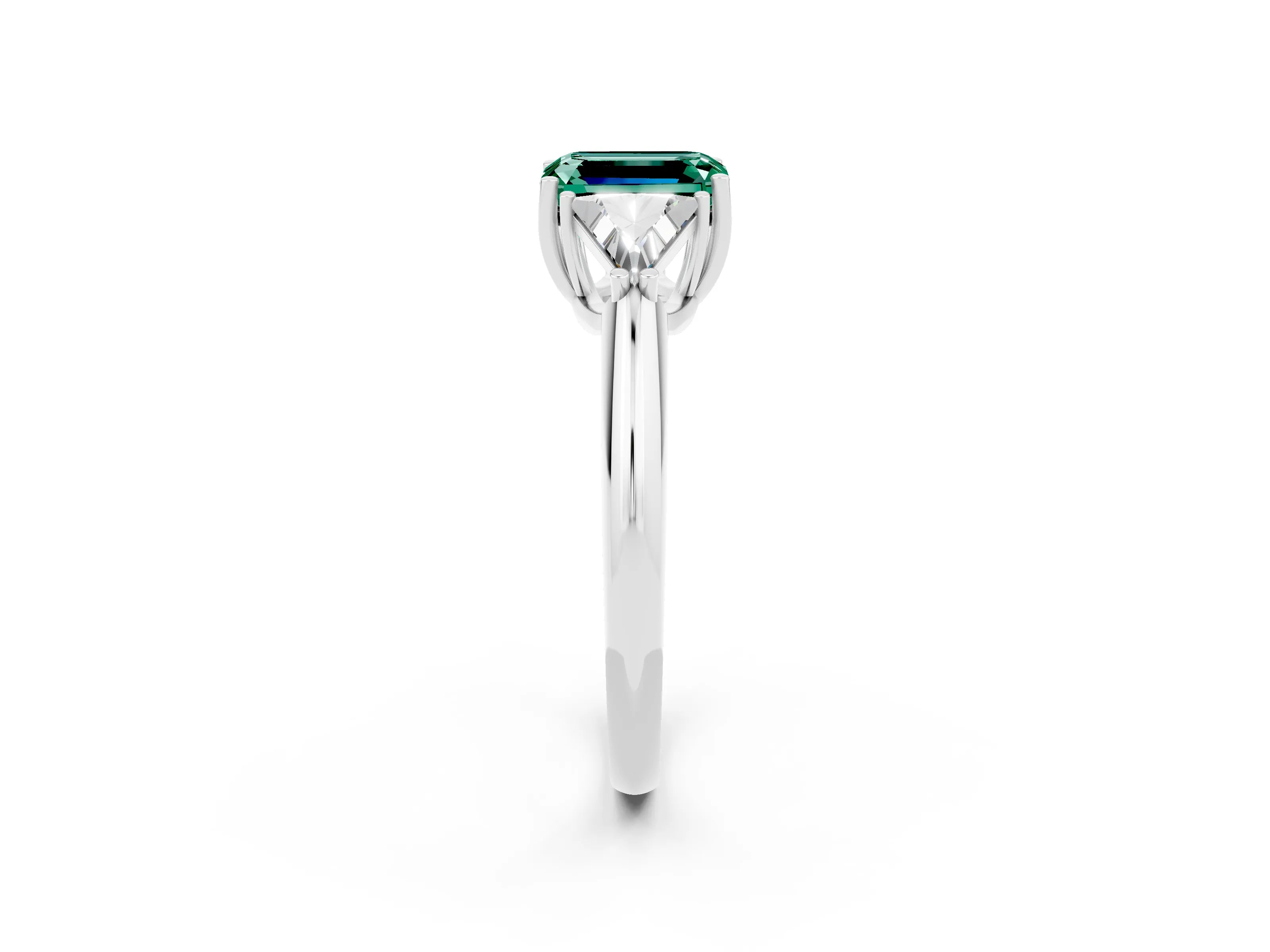 White gold Three-Stone Emerald Cut Cut Diamond Ring with Trillion Side Stones and Four-Prong Setting_2