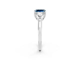 White gold Three-Stone Emerald Cut Cut Diamond Ring with Trillion Side Stones and Four-Prong Setting_2