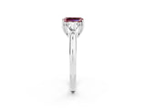 White gold Three-Stone Emerald Cut Cut Diamond Ring with Trillion Side Stones and Four-Prong Setting_2