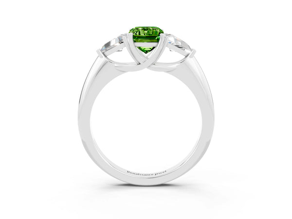 White gold Three-Stone Emerald Cut Cut Diamond Ring with Trillion Side Stones and Four-Prong Setting