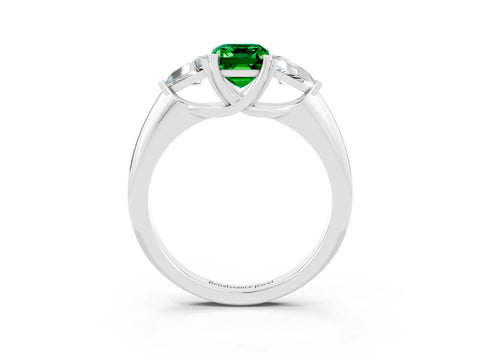 White gold Three-Stone Emerald Cut Cut Diamond Ring with Trillion Side Stones and Four-Prong Setting_3