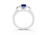 White gold Three-Stone Emerald Cut Cut Diamond Ring with Trillion Side Stones and Four-Prong Setting_3