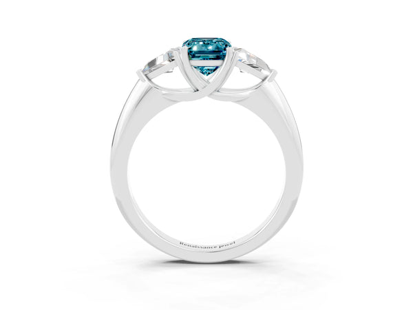 White gold Three-Stone Emerald Cut Cut Diamond Ring with Trillion Side Stones and Four-Prong Setting