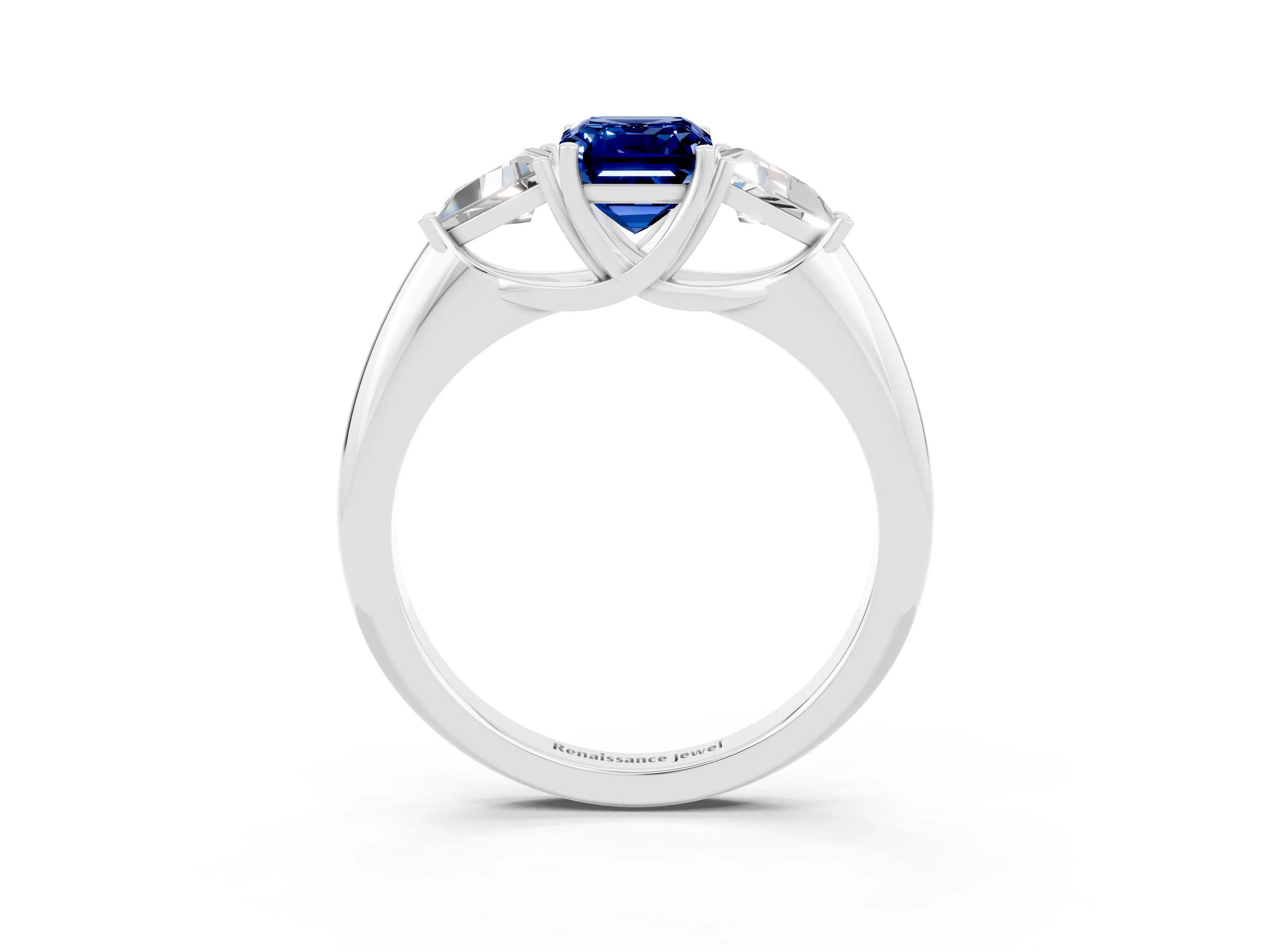 White gold Three-Stone Emerald Cut Cut Diamond Ring with Trillion Side Stones and Four-Prong Setting_3