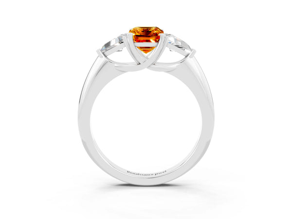 White gold Three-Stone Emerald Cut Cut Diamond Ring with Trillion Side Stones and Four-Prong Setting