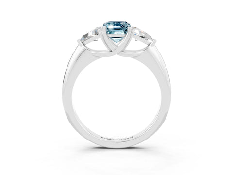 White gold Three-Stone Emerald Cut Cut Diamond Ring with Trillion Side Stones and Four-Prong Setting_3