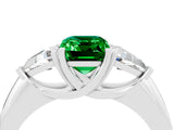 White gold Three-Stone Emerald Cut Cut Diamond Ring with Trillion Side Stones and Four-Prong Setting_4