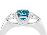 White gold Three-Stone Emerald Cut Cut Diamond Ring with Trillion Side Stones and Four-Prong Setting_4