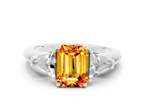 White gold Three-Stone Emerald Cut Cut Diamond Ring with Trillion Side Stones and Four-Prong Setting