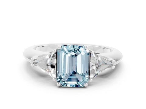 White gold Three-Stone Emerald Cut Cut Diamond Ring with Trillion Side Stones and Four-Prong Setting