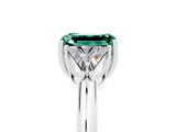 White gold Three-Stone Emerald Cut Cut Diamond Ring with Trillion Side Stones and Four-Prong Setting_5