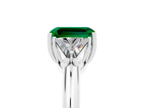 White gold Three-Stone Emerald Cut Cut Diamond Ring with Trillion Side Stones and Four-Prong Setting_5