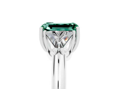 White gold Three-Stone Emerald Cut Cut Diamond Ring with Trillion Side Stones and Four-Prong Setting_5