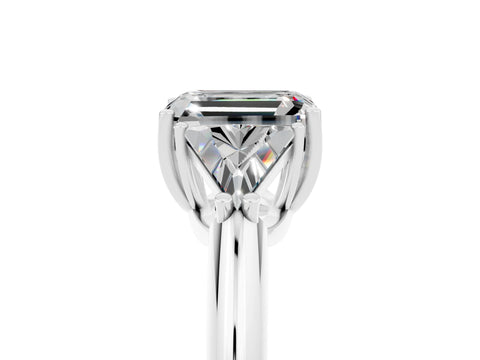 White gold Three-Stone Emerald Cut Cut Diamond Ring with Trillion Side Stones and Four-Prong Setting_5