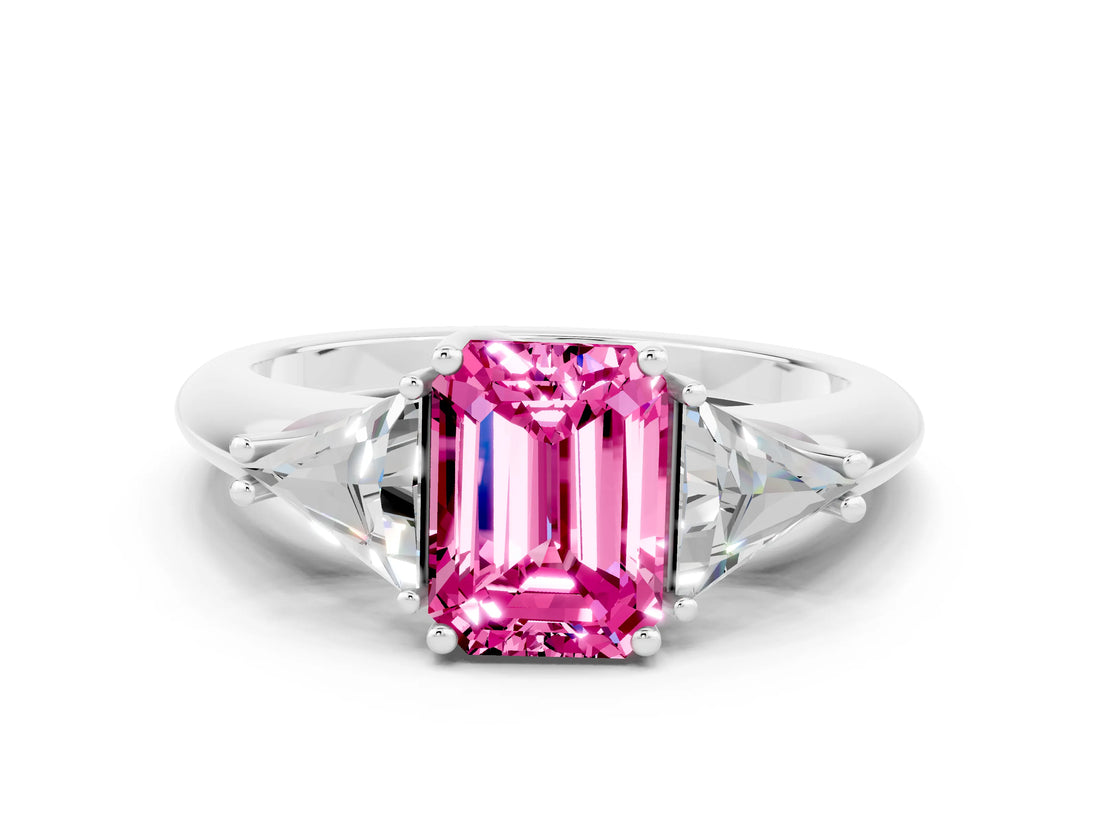 White gold Three-Stone Emerald Cut Cut Diamond Ring with Trillion Side Stones and Four-Prong Setting