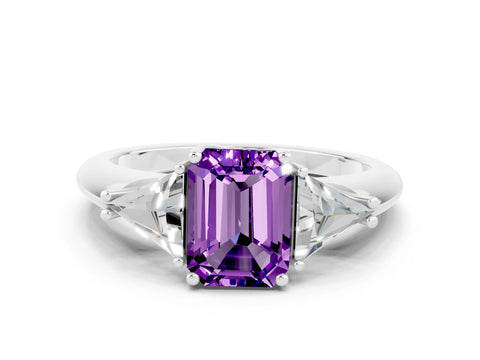 White gold Three-Stone Emerald Cut Cut Diamond Ring with Trillion Side Stones and Four-Prong Setting