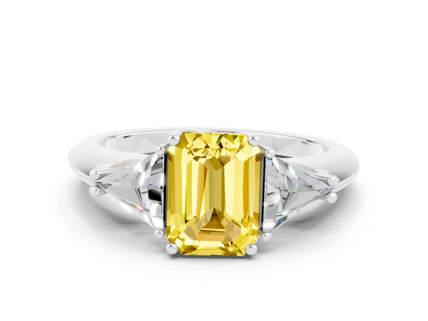 White gold Three-Stone Emerald Cut Yellow Sapphire Engagement Ring with Trillion Side Stones and Prong Setting