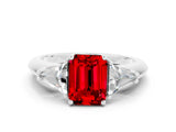 White gold Three-Stone Emerald Cut Cut Diamond Ring with Trillion Side Stones and Four-Prong Setting