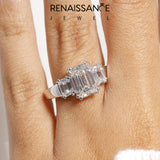 White gold Three-Stone Emerald Cut Diamond Ring with Channel Set Band and Four-Prong Setting_23