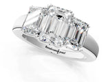 White gold Three-Stone Emerald Cut Diamond Ring with Channel Set Band and Four-Prong Setting_48