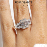 Platinum Three-Stone 2.06 Carat E VVS2 Emerald Cut Diamond Ring with Channel Set Band and Four-Prong Setting