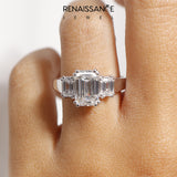 White gold Three-Stone Emerald Cut Diamond Ring with Channel Set Band and Four-Prong Setting_50